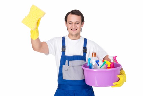Carpet cleaning team applying health and safety procedures