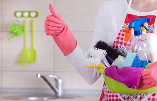 A cleaner maintaining shared stairwells in a Fulham property